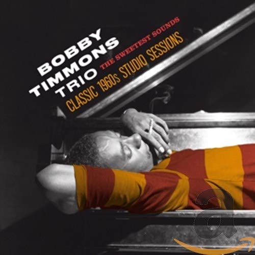 CD cover featuring pianist Bobby Timmons in a striped shirt.