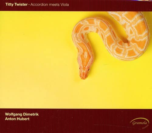 CD cover featuring a pale orange and yellow patterned snake on yellow.