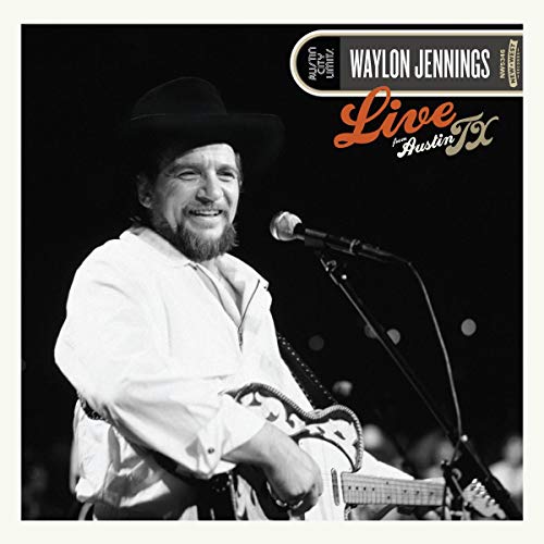 Vinyl album cover featuring Waylon Jennings playing guitar and singing into a microphone.