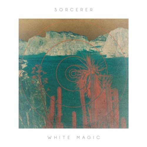 The image depicts a vinyl record cover. #### Alt text: "Vinyl album cover with abstract landscape, red spiral, and 'Sorcerer - White Magic' text."