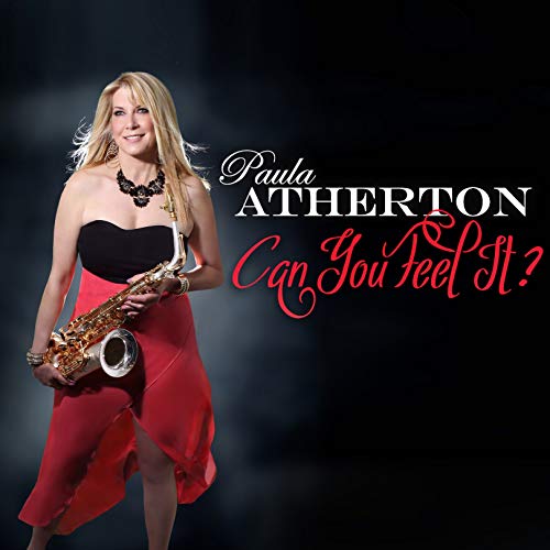 Paula Atherton holding a saxophone, album cover for “Can You Feel It?”.