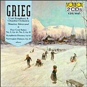 CD cover featuring winter scene with people ice-skating, snow-covered mountains in the background.