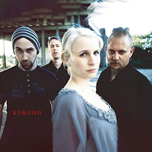 CD cover featuring four people, a woman in front, under a bridge.