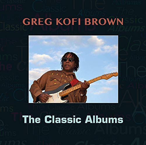 Album cover with a man playing an electric guitar against a blue sky.