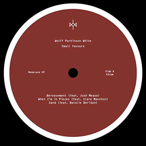 Red vinyl record label with white text listing song titles and artist.
