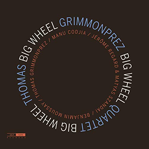 "Album cover with 'Thomas Grimmonprez Big Wheel' in a circular pattern on a brown background."