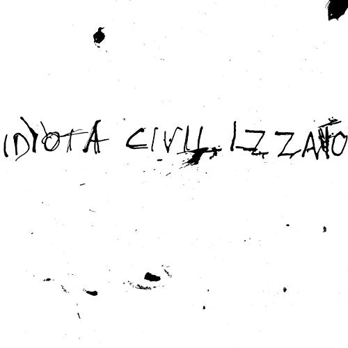 The image shows a white background with black handwritten text. Alt text: Black handwritten text "idiota civilizzato" on a white background with ink splatters.