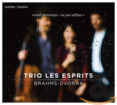 CD cover featuring three blurred figures with musical instruments.