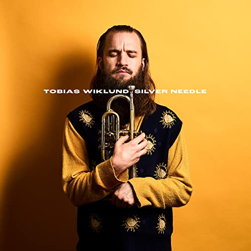Tobias Wiklund album cover featuring a man with a trumpet.