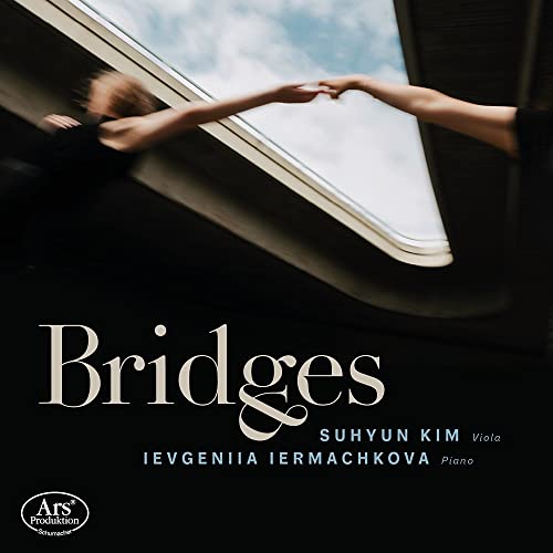 CD cover with abstract image of reaching hands under a skylight.