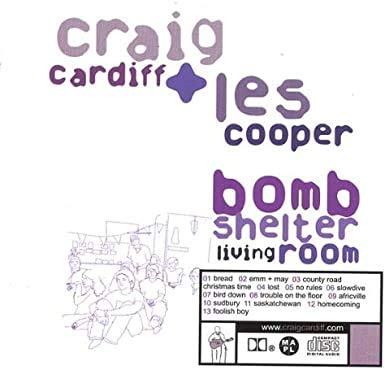 The image is a CD cover with purple text and a simple line drawing.
