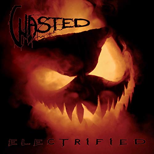 Dark album cover featuring a menacing, glowing face with sharp teeth.