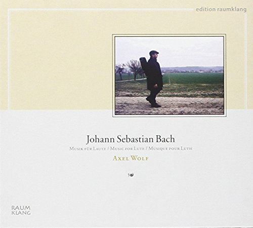 "CD cover with man walking outdoors, carrying a lute case, on beige and white background."