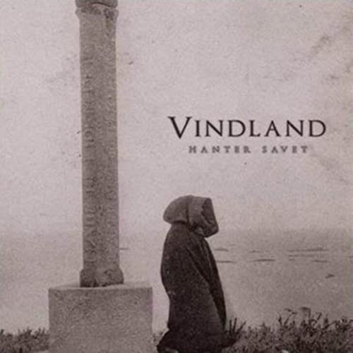 Vinyl album cover: a hooded figure stands before a stone pillar.