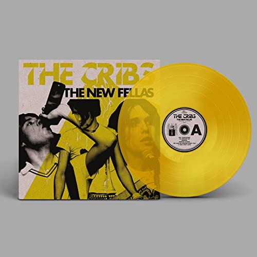 Yellow vinyl record with album cover featuring three people in yellow.