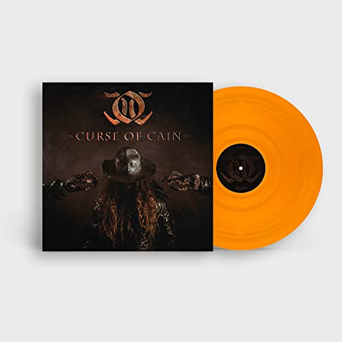 Orange vinyl record and album cover featuring a shadowy figure.