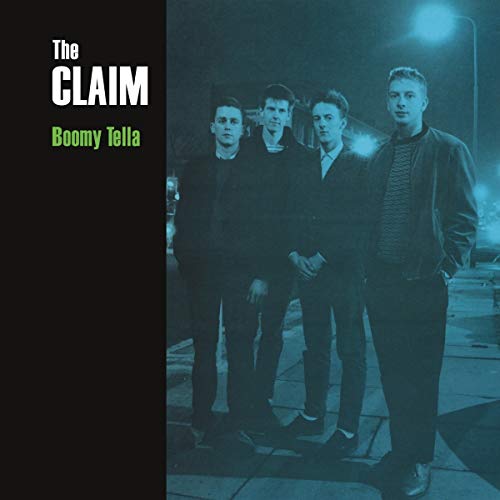 "Vinyl album cover with four men standing on a sidewalk at night."