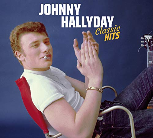 Johnny Hallyday album cover featuring a young man with a guitar.
