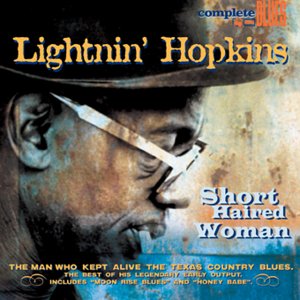 "Album cover featuring a close-up of Lightnin' Hopkins wearing a hat and sunglasses."
