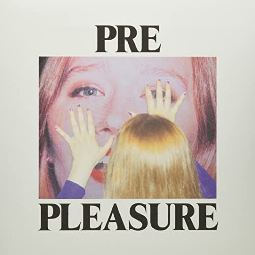 Vinyl record cover with a portrait of a woman and bold text.