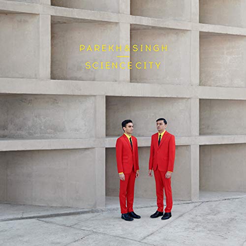 CD cover for Parekh & Singh’s “Science City” featuring two men in red suits.
