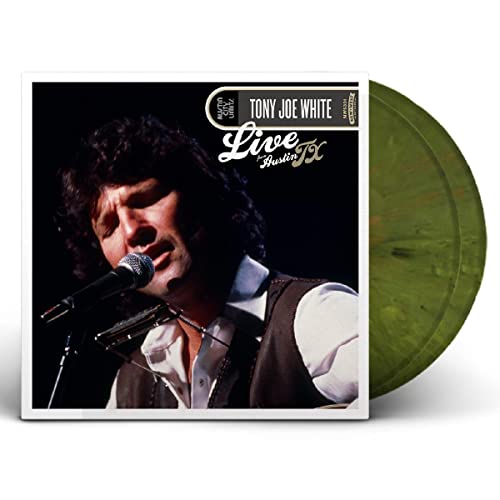 Tony Joe White album cover with a green vinyl record beside it.