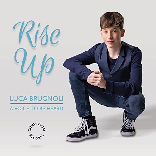CD cover featuring a young man in a suit, titled "Rise Up.