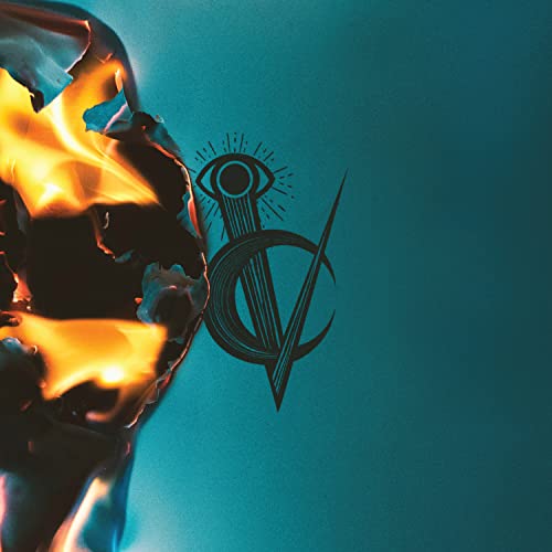 Burning paper with an eye and crescent moon symbol on teal.
