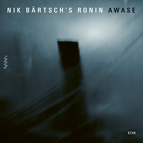 Dark blue vinyl album cover with blurry image and "Nik Bärtsch's Ronin Awase" text at top.
