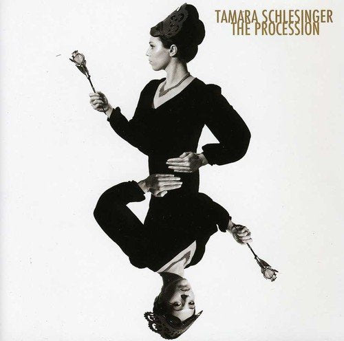Album cover with a black-and-white image of a woman upside down holding flowers.