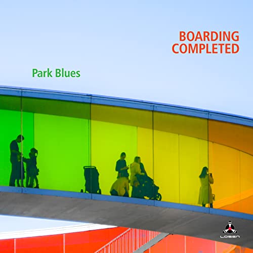 CD cover: silhouetted figures seen through colorful, layered glass panels.