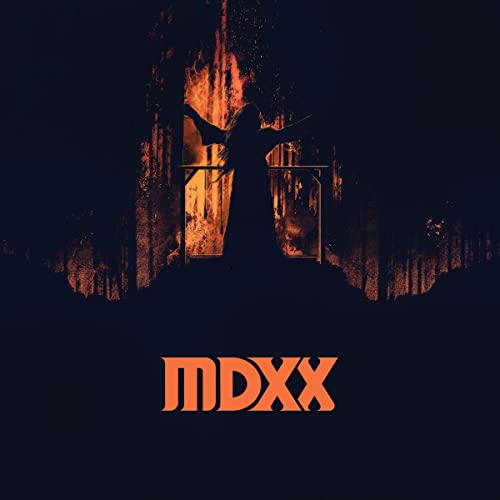 Dark album cover featuring a silhouetted figure before a fiery backdrop.