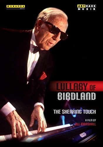 DVD cover featuring a man in a tuxedo playing piano, against a black background.