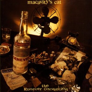 "CD cover with bottle of genever, fan, and old photographs on a dark table."