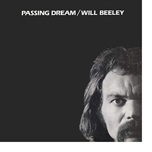 Vinyl record cover featuring a black and white portrait of a man.