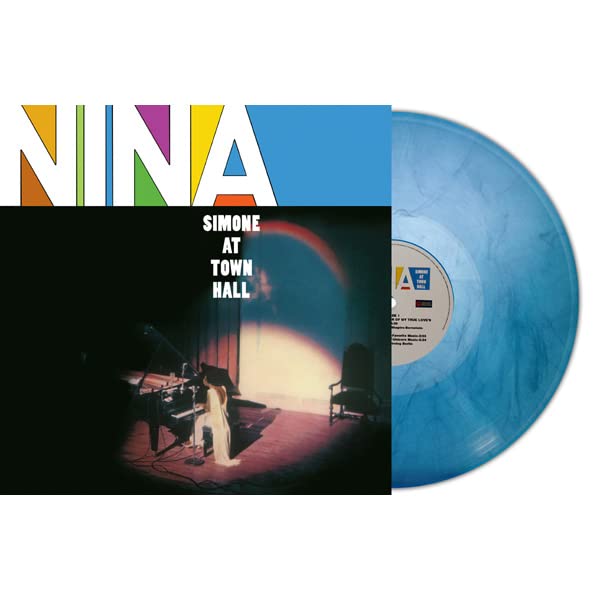 Nina Simone album cover and blue marble vinyl record shown at angle.