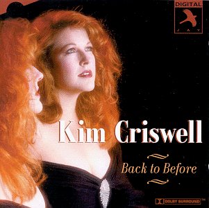 CD cover featuring Kim Criswell with red hair, looking upwards.