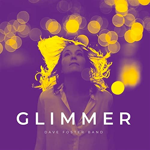 CD cover: woman with flowing yellow hair against purple bokeh.