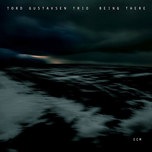 "Tord Gustavsen Trio - Being There" CD cover featuring a dark, stormy seascape with white text.