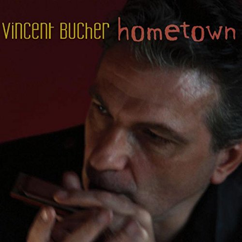 Album cover featuring a man holding a harmonica, with artist name and album title.