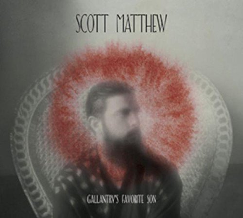 Album cover featuring a man with a beard, surrounded by red and white circle.