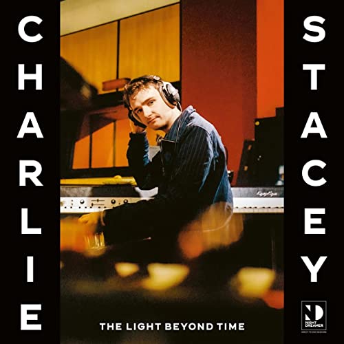 Charlie Stacey album cover featuring a man with headphones at a synthesizer.