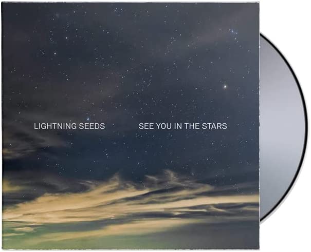"CD case with starry night sky cover and partially visible silver CD."