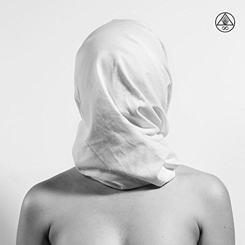 The image depicts a person with a cloth covering their head, against a plain background. For accessibility purposes, a suitable alt text could be: "Black and white image of a person with a white cloth covering their head."
