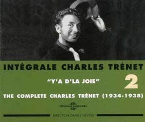 A Charles Trenet CD cover with a black-and-white portrait and green background.