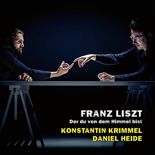 CD cover featuring two men facing each other across a table.