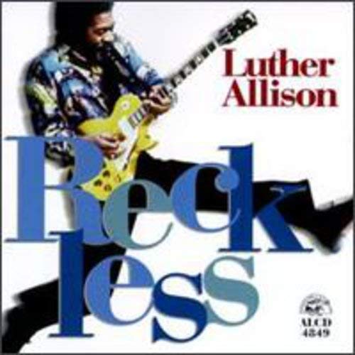 Luther Allison playing a yellow electric guitar on album cover.