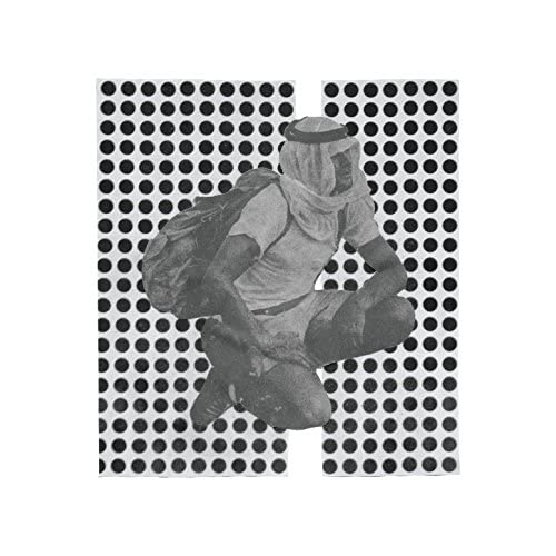 Black and white album cover featuring a person in desert attire.