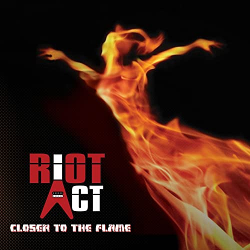 CD cover: fiery figure against a dark, textured background with band name.