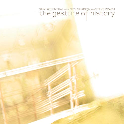 CD cover with blurred image of a wooden structure in warm tones.